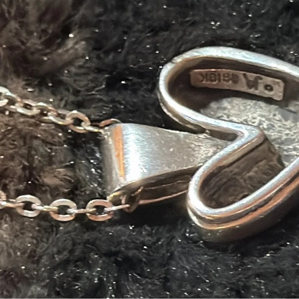 Elegant Silver and Gold Heart Pendant Necklace - Picture 3 of 6